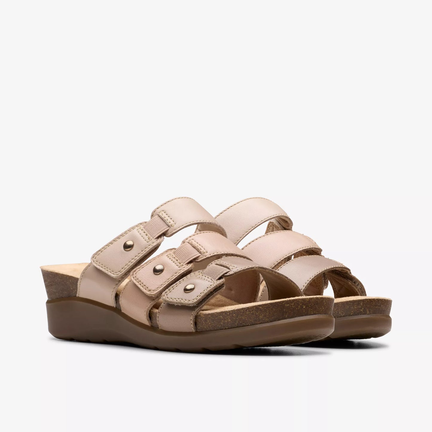 Three pairs of fashionable strap-style sandals